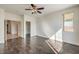 Bedroom boasts wood floors, ceiling fan, and lots of space and natural light at 2301 Bahama Point Ave, North Las Vegas, NV 89031