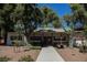 Inviting building exterior with well-maintained landscaping, providing a welcoming first impression for residents and guests at 271 Greenbriar Townhouse Way, Las Vegas, NV 89121