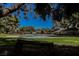 A beautiful community pool area featuring a large pool and a well maintained green lawn at 271 Greenbriar Townhouse Way, Las Vegas, NV 89121
