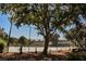 Well-maintained community tennis courts framed by mature trees, offering a scenic play environment at 271 Greenbriar Townhouse Way, Las Vegas, NV 89121