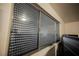 Window with black privacy blinds, interior shot at 271 Greenbriar Townhouse Way, Las Vegas, NV 89121