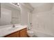 Clean bathroom featuring a vanity and tiled shower-tub combination at 2717 El Milagro St, Las Vegas, NV 89108