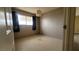 Simple bedroom with carpet flooring and a window at 2738 Fort Sumter Dr, North Las Vegas, NV 89030