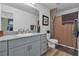 Modern bathroom with gray vanity, shower, and updated fixtures at 2827 Blue Mosaic Ln # 3, Las Vegas, NV 89183