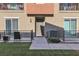 Townhouse exterior with private patio and front door at 2827 Blue Mosaic Ln # 3, Las Vegas, NV 89183
