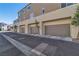 Attached garage with three parking spaces at 2827 Blue Mosaic Ln # 3, Las Vegas, NV 89183
