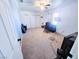 Spacious bedroom with carpet flooring and window at 2851 Goldrush St, Pahrump, NV 89048