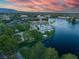 Aerial view of lakefront community at sunset at 2928 Cape Verde Ln, Las Vegas, NV 89128