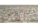 Aerial view of house and neighborhood, showcasing the community and surrounding area at 2928 Cape Verde Ln, Las Vegas, NV 89128