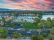 Aerial view of community with lake and resort pool at 2928 Cape Verde Ln, Las Vegas, NV 89128