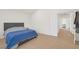 Bedroom with light wood floors and access to a hallway at 2928 Cape Verde Ln, Las Vegas, NV 89128