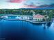 Stunning lakefront view of community pool and clubhouse at 2928 Cape Verde Ln, Las Vegas, NV 89128