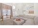 Open living room showcasing a sectional sofa and two-story high ceilings at 2928 Cape Verde Ln, Las Vegas, NV 89128