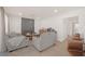 Spacious living room boasts a cozy fireplace and ample seating at 2928 Cape Verde Ln, Las Vegas, NV 89128