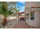 Covered patio with red tile flooring and seating area at 2928 Cape Verde Ln, Las Vegas, NV 89128