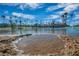 Sandy beach with calm water and small pond at 2928 Cape Verde Ln, Las Vegas, NV 89128