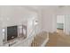 Upstairs hallway with views into living room and additional bedroom at 2928 Cape Verde Ln, Las Vegas, NV 89128
