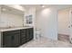 Bathroom with double vanity and walk in closet at 2962 Torreon Ln, Las Vegas, NV 89121