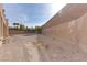 Landscaped backyard with retaining walls at 37 Carolina Cherry Dr, Las Vegas, NV 89141