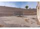 Large backyard with trampoline and retaining walls at 37 Carolina Cherry Dr, Las Vegas, NV 89141