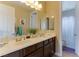 Modern bathroom with double vanity and updated fixtures at 37 Carolina Cherry Dr, Las Vegas, NV 89141
