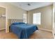 Comfortable bedroom with a queen-size bed and walk-in closet at 37 Carolina Cherry Dr, Las Vegas, NV 89141