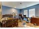 bedroom with twin bed, desk, and dresser at 37 Carolina Cherry Dr, Las Vegas, NV 89141