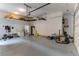 Garage with bicycles, shelving and storage at 37 Carolina Cherry Dr, Las Vegas, NV 89141