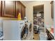 Laundry room with washer, dryer, and cabinets at 37 Carolina Cherry Dr, Las Vegas, NV 89141