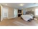 Large main bedroom with plush carpet and access to the outside at 37 Carolina Cherry Dr, Las Vegas, NV 89141