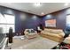Relaxing media room with ample seating and large TV at 37 Carolina Cherry Dr, Las Vegas, NV 89141