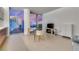 Modern living space featuring floor-to-ceiling windows with city views and minimalist decor at 3722 Las Vegas Blvd # 305, Las Vegas, NV 89158