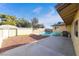 Spacious backyard featuring a pool, patio, and shed, perfect for outdoor living and entertaining at 4110 Oakhill Ave, Las Vegas, NV 89121