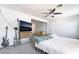Bedroom with ceiling fan, carpet, and adjacent sitting room at 4110 Oakhill Ave, Las Vegas, NV 89121