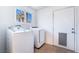 Convenient laundry room with modern appliances, offering functionality and ease of use at 4110 Oakhill Ave, Las Vegas, NV 89121