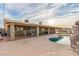 Beautiful backyard featuring a covered patio and pool, ideal for outdoor enjoyment at 4410 E Boston Ave, Las Vegas, NV 89104