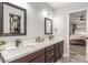 Modern bathroom with a double sink vanity and walk-in closet at 4410 E Boston Ave, Las Vegas, NV 89104