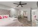 Bedroom featuring a bed, makeup vanity, and mirrored closet doors at 4410 E Boston Ave, Las Vegas, NV 89104