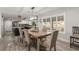 A dining room connects seamlessly to a kitchen with sleek, modern appliances at 4410 E Boston Ave, Las Vegas, NV 89104