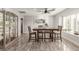 Dining area with stylish table set, modern cabinet, and tile flooring for elegant meals at 4410 E Boston Ave, Las Vegas, NV 89104