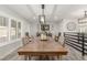 Bright dining room with a long wooden table perfect for Gathering gatherings at 4410 E Boston Ave, Las Vegas, NV 89104