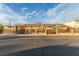 Inviting single-story home with solar panels, a stylish fence, and a serene front yard at 4410 E Boston Ave, Las Vegas, NV 89104