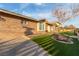 Beautiful home with a well-manicured front yard, complemented by lush artificial turf at 4410 E Boston Ave, Las Vegas, NV 89104