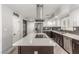 A kitchen with stainless appliances and a large island is a chef's dream at 4410 E Boston Ave, Las Vegas, NV 89104