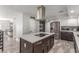 Open-concept kitchen boasts a large island and modern stainless steel appliances at 4410 E Boston Ave, Las Vegas, NV 89104