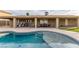 Inviting backyard pool with a covered patio, perfect for outdoor entertaining and relaxation at 4410 E Boston Ave, Las Vegas, NV 89104
