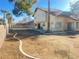 Large backyard with a curving border and space for landscaping at 4684 Trevins Ave, Las Vegas, NV 89103
