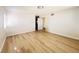 Spacious bedroom with light walls and wood-look floors at 4684 Trevins Ave, Las Vegas, NV 89103