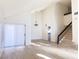 Open living room with hardwood floors and sliding glass door at 4684 Trevins Ave, Las Vegas, NV 89103