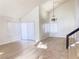 Bright and spacious living room with high ceilings, hardwood floors and a chandelier at 4684 Trevins Ave, Las Vegas, NV 89103